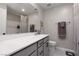 Well-lit bathroom with a sleek vanity, modern fixtures, and a combination of gray tones for a clean and contemporary look at 494 Mahogany Ridge St, Las Vegas, NV 89138
