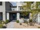 Charming home features a welcoming porch with seating, great for relaxing outdoors at 494 Mahogany Ridge St, Las Vegas, NV 89138