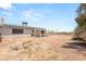Backyard features gravel and a covered porch area at 5085 Raven Ave, Las Vegas, NV 89139