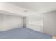 Bedroom with a large window, neutral walls, and carpeted floor at 5085 Raven Ave, Las Vegas, NV 89139