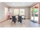 Bright dining area with sliding glass door to patio at 5852 Clear Haven Ln, North Las Vegas, NV 89081