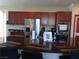 Kitchen featuring a large island with granite countertops and stainless steel appliances at 5852 Clear Haven Ln, North Las Vegas, NV 89081