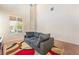 Bright living area with a large window and neutral walls, offering a clean and modern look at 5852 Clear Haven Ln, North Las Vegas, NV 89081