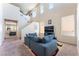 Inviting living room with a high ceiling, filled with natural light and plenty of space for relaxation at 5852 Clear Haven Ln, North Las Vegas, NV 89081