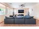 Bright living room featuring a large entertainment center, perfect for relaxing and enjoying your favorite shows at 5852 Clear Haven Ln, North Las Vegas, NV 89081