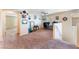 Spacious loft area featuring a desk, ceiling fan, and ample natural light perfect for a home office at 5852 Clear Haven Ln, North Las Vegas, NV 89081