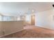 Expansive open loft area with neutral tones, plush carpeting, and plenty of natural light at 5852 Clear Haven Ln, North Las Vegas, NV 89081