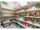 Walk-in pantry with ample shelving for storage at 5852 Clear Haven Ln, North Las Vegas, NV 89081