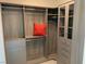 Spacious closet with built-in shelving, drawers and hanging rods at 6511 Dove Point Pl, Las Vegas, NV 89130