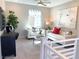 Bright and airy living room with plush seating, stylish decor, and ample natural light at 6511 Dove Point Pl, Las Vegas, NV 89130