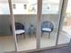 Cozy outdoor patio with seating, perfect for relaxing and enjoying the view at 6511 Dove Point Pl, Las Vegas, NV 89130