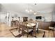 Dining room that flows into an open floor plan into the living room and kitchen at 6624 Jade Jaguar St, North Las Vegas, NV 89086