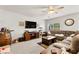 Cozy living room featuring a large sectional sofa, and a media center at 6624 Jade Jaguar St, North Las Vegas, NV 89086