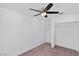 This bedroom has a ceiling fan and closet, and neutral tones throughout the room at 688 Castlebridge Ave, Las Vegas, NV 89123
