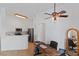 Inviting dining space offering an office nook with a fan and access to the kitchen at 688 Castlebridge Ave, Las Vegas, NV 89123