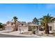 Beautiful single-Gathering home with desert landscaping, two-car garage, and well-maintained facade at 688 Castlebridge Ave, Las Vegas, NV 89123