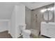 Updated bathroom features a tiled walk-in shower and modern fixtures at 6940 Emerald Springs Ln, Las Vegas, NV 89113