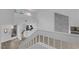 Light-filled entryway with hardwood floors and a staircase leading to the upper level at 6940 Emerald Springs Ln, Las Vegas, NV 89113