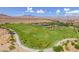 Expansive aerial view of the park featuring sports field, picnic area, and desert landscape at 7715 Peaceful Trellis Dr, Las Vegas, NV 89179