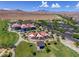 Aerial view of community park featuring picnic areas, walking paths, and desert scenery at 7715 Peaceful Trellis Dr, Las Vegas, NV 89179
