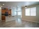 Bright and open living room has wood floors and lots of natural light at 7715 Peaceful Trellis Dr, Las Vegas, NV 89179