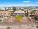 Aerial view of a large backyard featuring a desert landscape and walled perimeter at 7756 River Mist Ct, Las Vegas, NV 89113