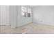 Bright bedroom features neutral walls and floors with two large windows at 7756 River Mist Ct, Las Vegas, NV 89113