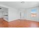 Bonus room with hardwood floors and a view of the hallway at 7756 River Mist Ct, Las Vegas, NV 89113
