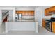 Kitchen island with stainless steel appliances and granite countertops at 7756 River Mist Ct, Las Vegas, NV 89113