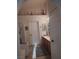 Bathroom featuring a vanity, tub and enclosed shower stall at 7894 W Patrick Ln, Las Vegas, NV 89113