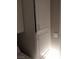Storage in laundry room is white cabinets with stainless steel hardware at 7894 W Patrick Ln, Las Vegas, NV 89113