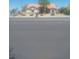 Charming single-story home featuring a red tile roof and a well-maintained front yard at 7894 W Patrick Ln, Las Vegas, NV 89113