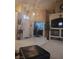 Bright foyer with white tile flooring and high ceilings, leading to other rooms in the home at 7894 W Patrick Ln, Las Vegas, NV 89113