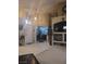 Bright foyer with white tile flooring and high ceilings, leading to other rooms in the home at 7894 W Patrick Ln, Las Vegas, NV 89113