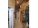 Entryway boasting tiled floors and decorative wall art and decor for a welcoming ambiance at 7894 W Patrick Ln, Las Vegas, NV 89113