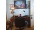 This home office features a desk, comfortable seating, and unique decor at 7894 W Patrick Ln, Las Vegas, NV 89113