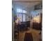 Serene home office with a large window, desk, and comfortable seating area at 7894 W Patrick Ln, Las Vegas, NV 89113
