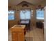 Bright kitchen featuring an island and a dining area with natural light at 7894 W Patrick Ln, Las Vegas, NV 89113
