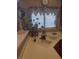 Bright kitchen featuring white countertops, a sink, and wood cabinetry at 7894 W Patrick Ln, Las Vegas, NV 89113