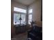 Bright living room with plenty of natural light, cozy furniture and tasteful decor at 7894 W Patrick Ln, Las Vegas, NV 89113