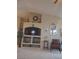 Living room with a built in TV console, decorations on the wall, and a large mirror at 7894 W Patrick Ln, Las Vegas, NV 89113