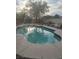 Inviting pool and sun-drenched backyard offer endless opportunities for relaxation at 7894 W Patrick Ln, Las Vegas, NV 89113