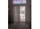 View from bedroom to backyard with sparkling pool and covered patio area at 7894 W Patrick Ln, Las Vegas, NV 89113
