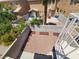Aerial view of the enclosed backyard showcasing the gravel area and perimeter landscaping at 8072 Cimarron Ridge Dr # 201, Las Vegas, NV 89128
