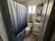 Bathroom featuring a stand-alone sink and shower with ombre curtain at 8072 Cimarron Ridge Dr # 201, Las Vegas, NV 89128