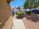 Home exterior showing well-maintained landscaping and a clear view of the neighborhood at 8072 Cimarron Ridge Dr # 201, Las Vegas, NV 89128