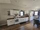 Kitchen features updated white cabinets and modern appliances at 8072 Cimarron Ridge Dr # 201, Las Vegas, NV 89128