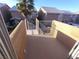 A private patio offers outdoor space with a gated staircase, perfect for relaxing and enjoying the view at 8072 Cimarron Ridge Dr # 201, Las Vegas, NV 89128