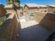 Private upper patio with stucco walls, connecting to the main house via a spiral staircase at 8072 Cimarron Ridge Dr # 201, Las Vegas, NV 89128