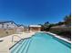 Enjoy the community pool on a sunny day, steps away from residential homes at 8072 Cimarron Ridge Dr # 201, Las Vegas, NV 89128